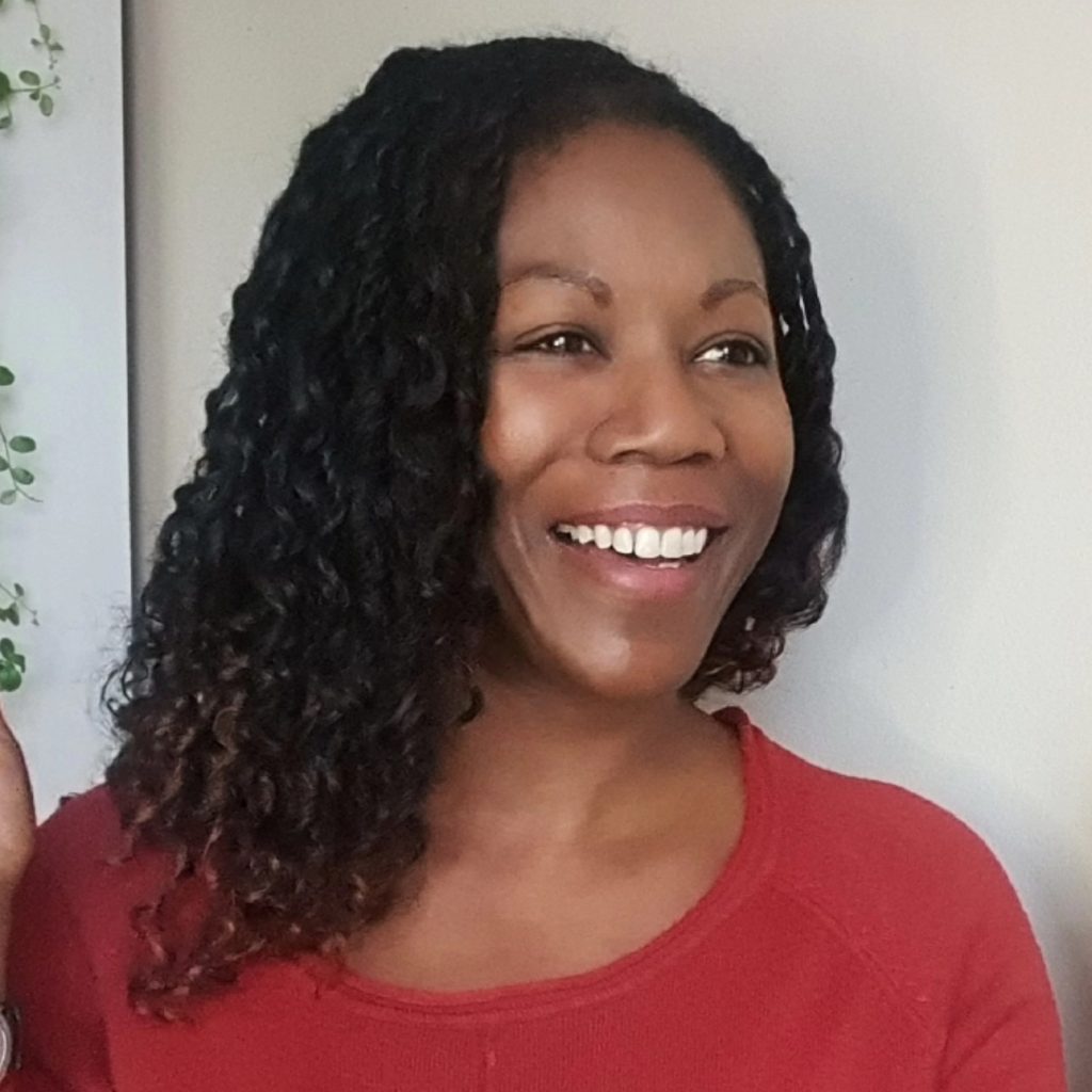 A headshot photo of Nadine Campbell