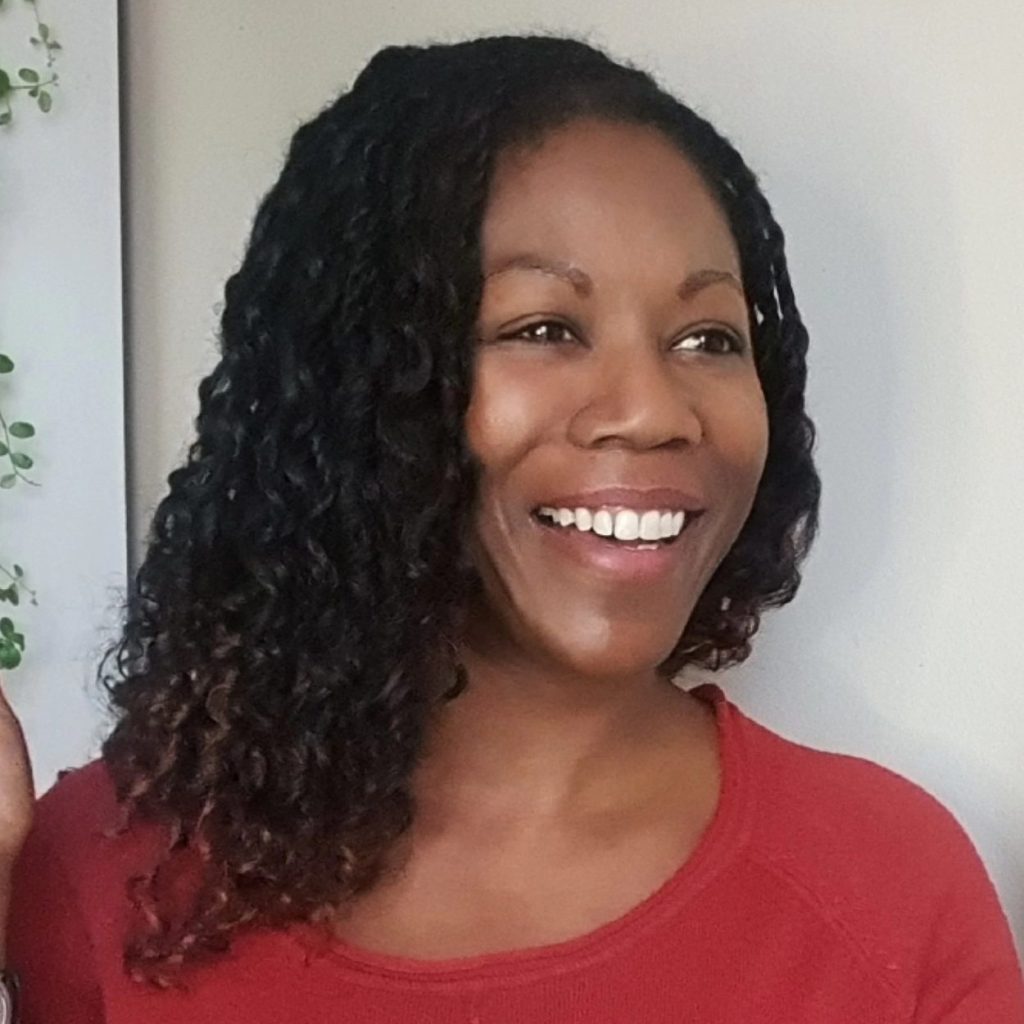 A headshot photo of Nadine Campbell